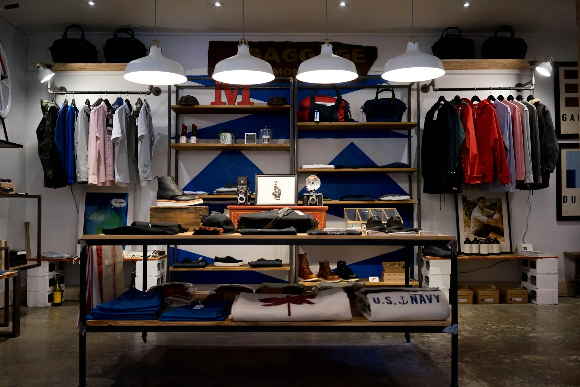 Interior of a clothing retail store with neatly arranged product displays